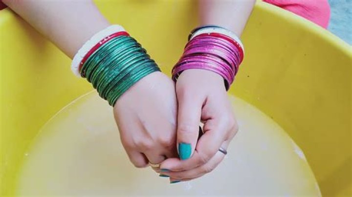 How do you remove tight bangles from your hands?